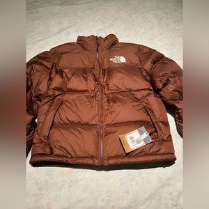 The Northface puffer jacket 700. It hasn’t worn. It attached tag on it.